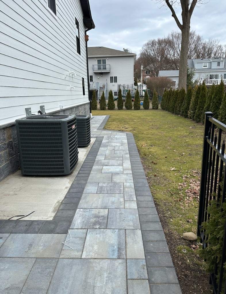 Completed side-yard paver walkway in Paramus, New Jersey
